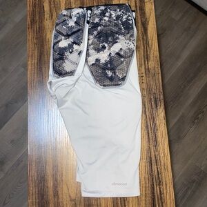 Adidas, men’s climate control football girdle, size large.